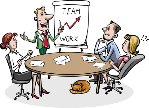 Cartoon of a small team meeting around a table with laptops